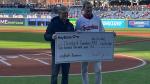 Chris Gorman presented the donation from the KeyBank Foundation to Cleveland Guardians Owner, Chairman and CEO Paul Dolan during “KeyBank Bicentennial Night” on April 12th at Progressive Field. 